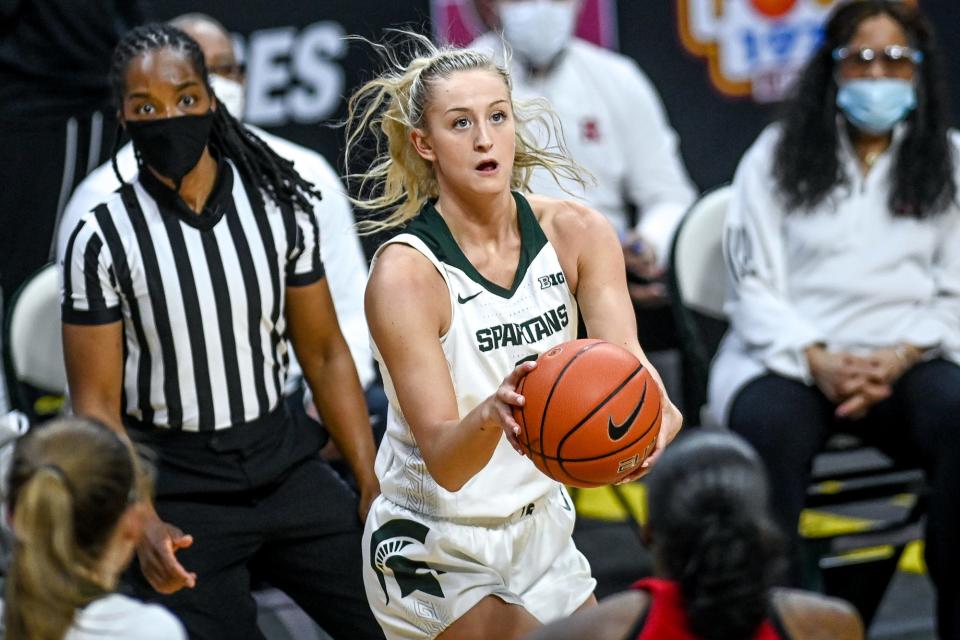 Michigan State's Tory Ozment makes a 3-pointer against Rutgers during the second quarter on Wednesday, Feb. 24, 2021, at the Breslin Center in East Lansing.