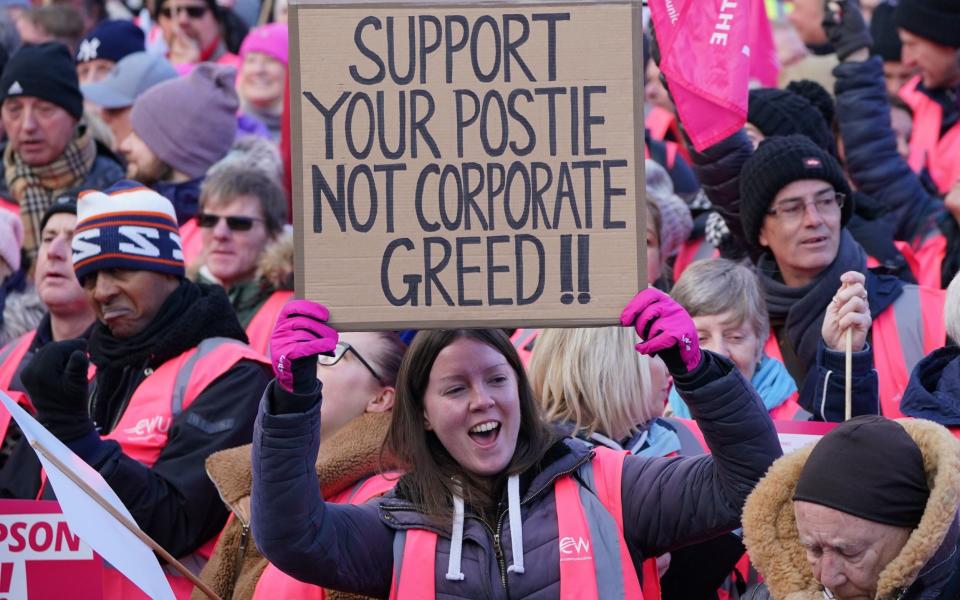 Communication Workers Union (CWU) members hold a rally in Parliament Square - Jonathan Brady/PA Wire