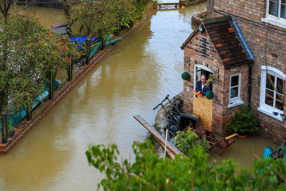 Flooding in Ironbridge, Shropshire, as residents in riverside properties in the area have been told to leave their homes and businesses immediately after temporary flood barriers were overwhelmed by water.