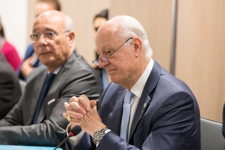 UN Special Envoy of the Secretary-General for Syria Staffan de Mistura (R) attends a new round of negotiation with Syria's government delegation during the intra-Syrian talks, at Palais des Nations in Geneva, Switzerland, 14 July 2017. REUTERS/Xu Jinquan/Pool