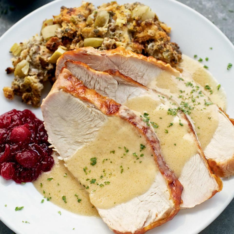 Ruth's Chris Thanksgiving Day menu includes sliced oven roasted turkey, sausage and herb stuffing, garlic mashed potatoes and sweet potato casserole. It costs $44 per person.
