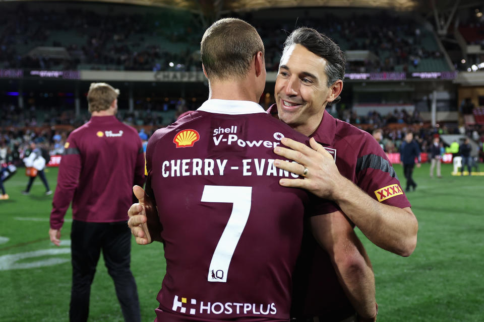 Daly Cherry-Evans and coach Billy Slater embrace.