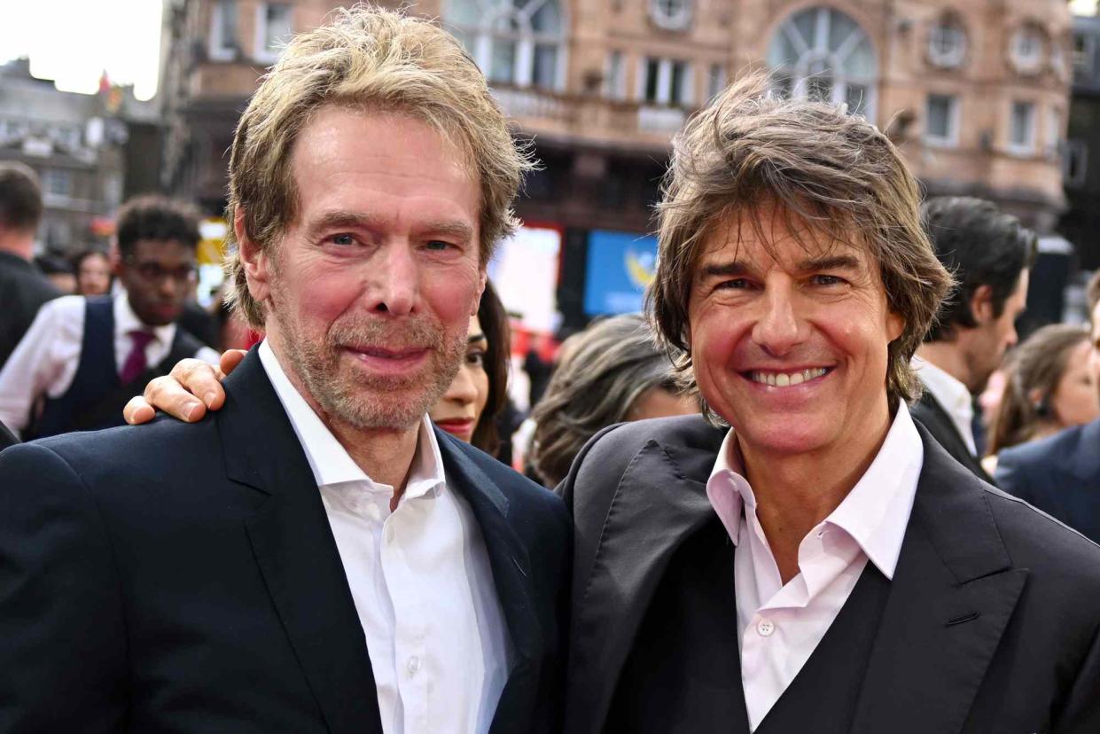 <p>Gareth Cattermole/Getty</p> Jerry Bruckheimer and Tom Cruise on June 22, 2023