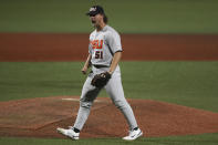 Oregon State pitcher Ben Ferrer celebrates his team's 4-3 win over Auburn in an NCAA college baseball tournament super regional game on Sunday, June 12, 2022, in Corvallis, Ore. (AP Photo/Amanda Loman)