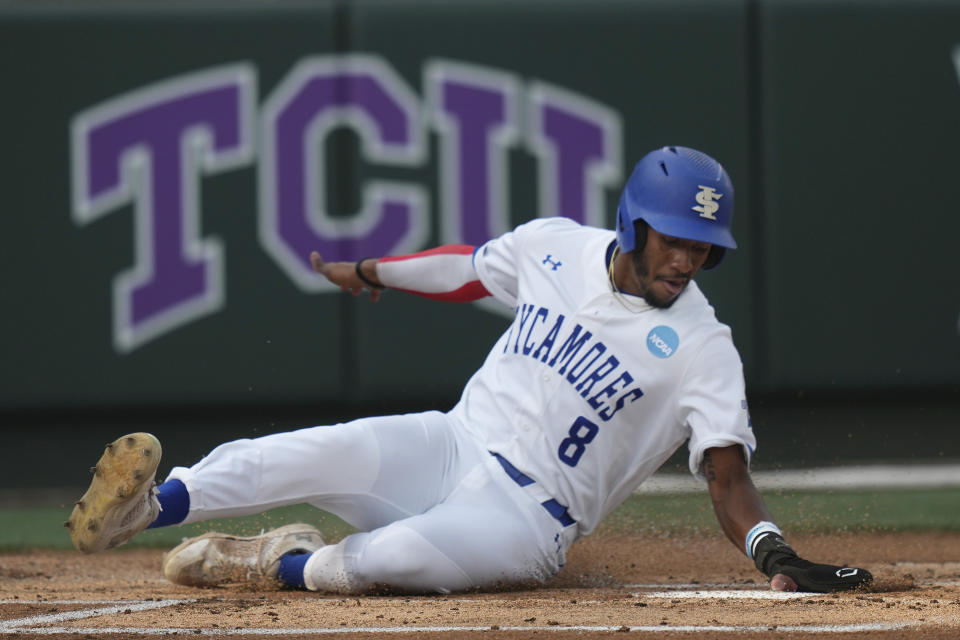 Indiana State's Randal Diaz (8) scores on a single by teammate Keegan Watson during the first inning of an NCAA college baseball super regional game against TCU in Fort Worth, Texas, Saturday, June 10, 2023. (AP Photo/LM Otero)