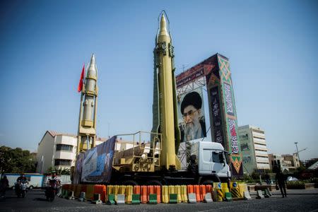 FILE PHOTO: A display featuring missiles and a portrait of Iran's Supreme Leader Ayatollah Ali Khamenei is seen at Baharestan Square in Tehran, Iran September 27, 2017. Nazanin Tabatabaee Yazdi/TIMA/File Photo via REUTERS