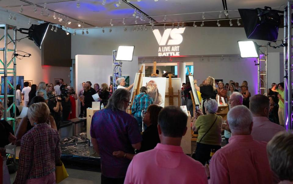 Artists compete in “Versus: A Live Art Battle” at Mark Arts. Each artist had 20 minutes to make a creation in front of a live audience during the fundraiser for Mark Arts. Jaime Green/The Wichita Eagle