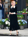 <p>Maya Hawke pairs her black-and-white dress with pink headphones while out in N.Y.C. on May 4.</p>