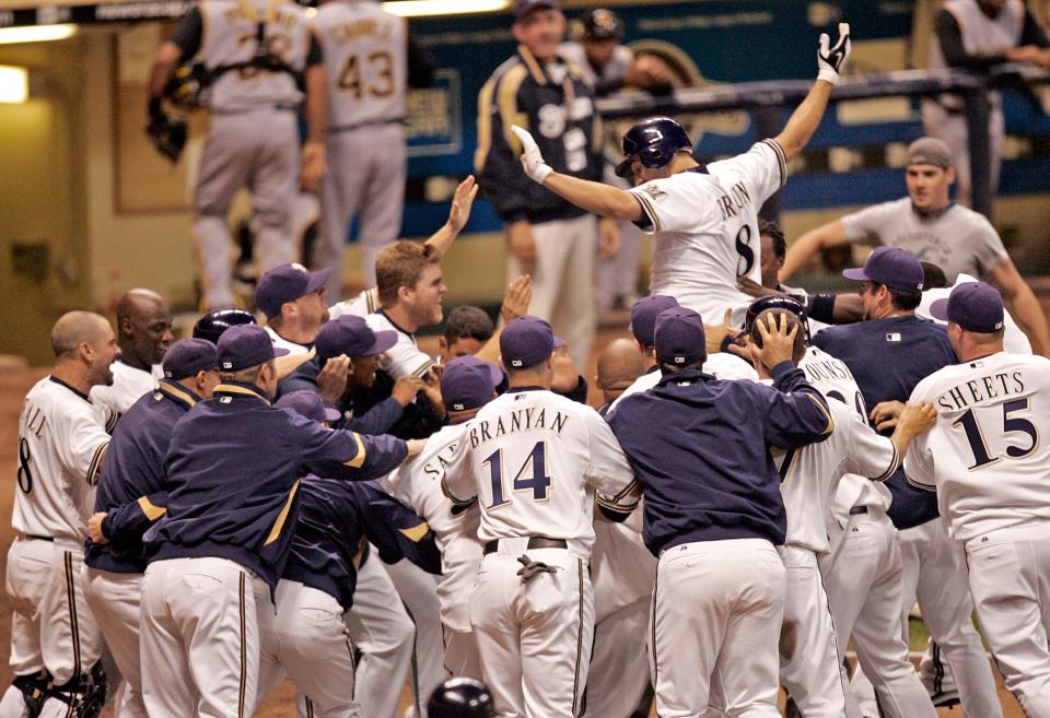 Milwaukee Brewers' Ryan Braun jumps into the arms of teammates after a walk-off grand slam home run in the 10th inning at Miller Park Thursday, September 25, 2008.