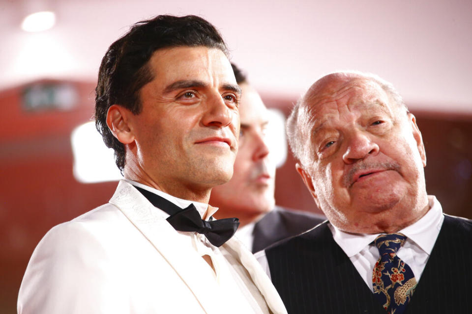 Oscar Isaac and Paul Schrader pose for photographers at the premiere of “The Card Counter” in Venice - Credit: Joel C Ryan/Invision/AP