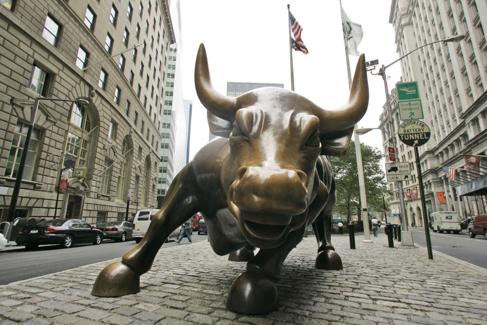 FILE - This Oct. 16, 2006 file photo showsThe charging bull in lower Manhattan in New York. Arturo Di Modica, the artist who sculpted the bronze bull statue in New York, an iconic symbol of Wall Street, has died in his native Sicily. Di Modica died at his home in Vittoria on Friday, Feb. 19, 2021 the town said in a statement. (AP Photo/Mary Altaffer, File)