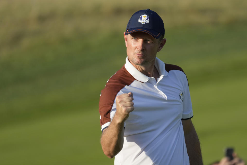 Europe's Justin Rose celebrates on the 14th green during his afternoon Fourballs match at the Ryder Cup golf tournament at the Marco Simone Golf Club in Guidonia Montecelio, Italy, Saturday, Sept. 30, 2023. (AP Photo/Andrew Medichini)