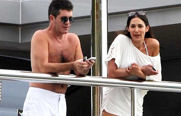 Simon Cowell enjoys the day with fiance Mezhgan Hussainy. PacificCoastNews.com