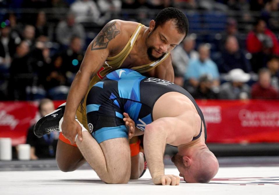 Mark Hall controls Max Dean in a 86 kg consolation bout at the U.S. Olympic Team Trials at the Bryce Jordan Center on Saturday, April 20, 2024. Hall won by tech. superiority.