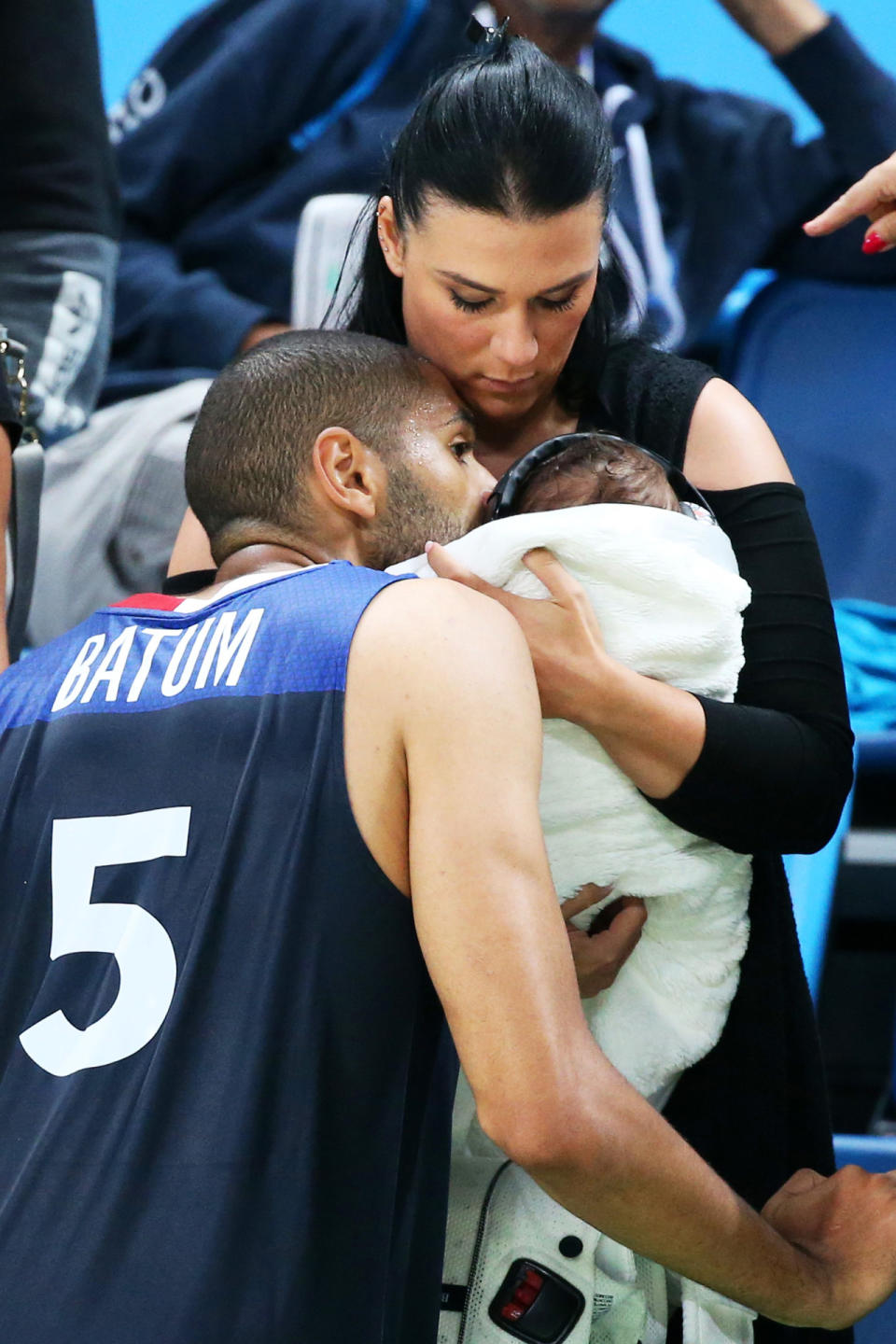 <p>Nicolas Batum of France kisses son Ayden Richard Batum following the men’s basketball match between France and Serbia.</p>