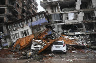 <p>HATAY, TURKIYE - FEBRUARY 06: A view of a damaged building in Hatay, Turkiye after 7.7 and 7.6 magnitude earthquakes hits Turkiye's Hatay, on February 06, 2023. Disaster and Emergency Management Authority (AFAD) of Turkiye said the 7.7 magnitude quake struck at 4.17 a.m. (0117GMT) and was centered in the Pazarcik district and 7.6 magnitude quake struck in Elbistan district in the province of Kahramanmaras in the south of Turkiye. Gaziantep, Sanliurfa, Diyarbakir, Adana, Adiyaman, Malatya, Osmaniye, Hatay, and Kilis provinces are heavily affected by the earthquakes. (Photo by Ercin Erturk/Anadolu Agency via Getty Images)</p> 