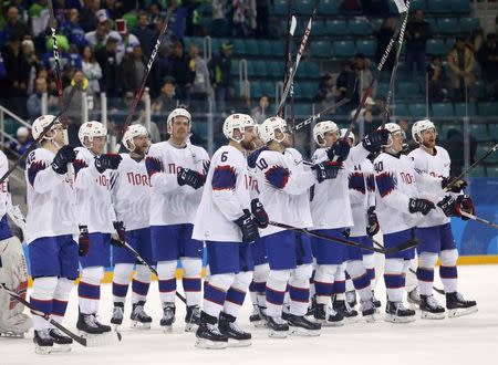 Ice Hockey - Pyeongchang 2018 Winter Olympics - Men's Playoff Match - Slovenia v Norway - Gangneung Hockey Centre, Gangneung, South Korea - February 20, 2018 - Players of Norway's team celebrate their win. REUTERS/Kim Kyung-Hoon