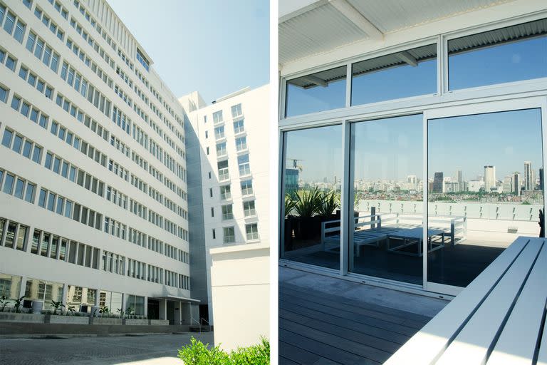 La entrada Quartier Retiro Lofts (el antiguo Hospital Ferroviario totalmente renovado y refuncionalizado por el estudio de arquitectura Camps Tiscornia), y la vista a la ciudad reflejada en el espacio común de la terraza.