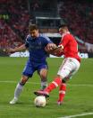 Benfica's Oscar Cardozo (right) and Chelsea's Branislav Ivanovic battle for the ball