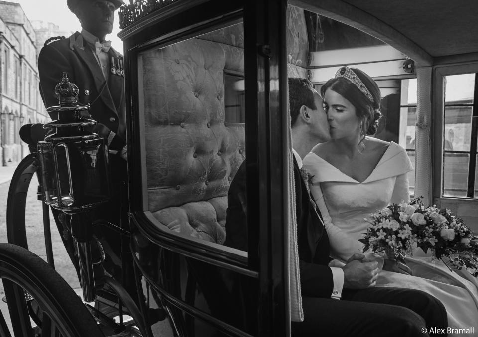 Princess Eugenie and Jack Brooksbank smooch in the Scottish State Coach as it returns to Windsor Castle following the Carriage Procession. (Photo: Alex Bramall/Courtesy Buckingham Palace)