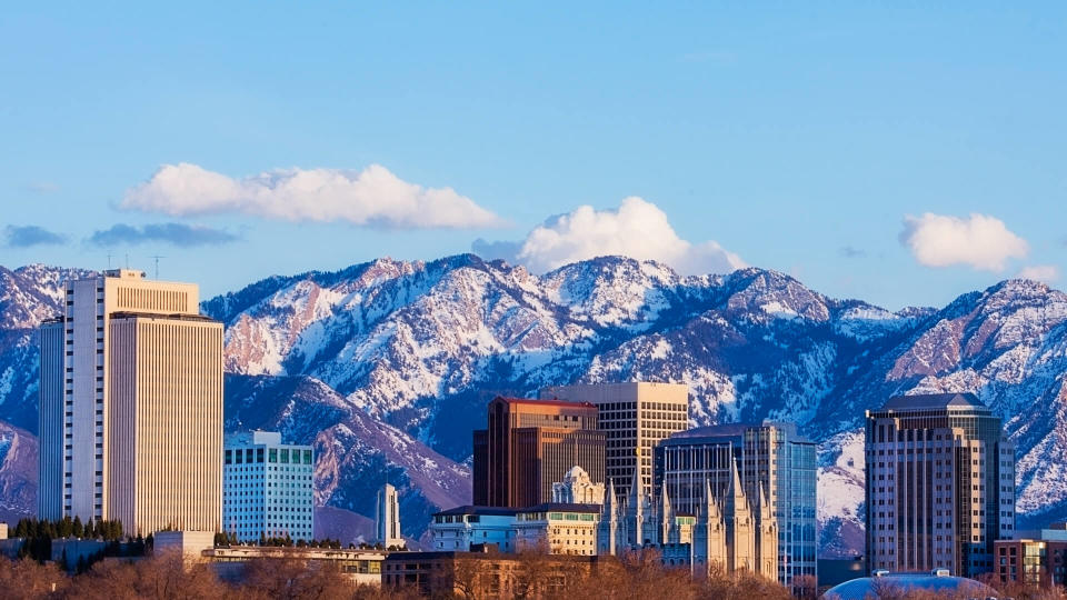 Skyline of Salt Lake City, Utah, USA in early spring as the sun sets.