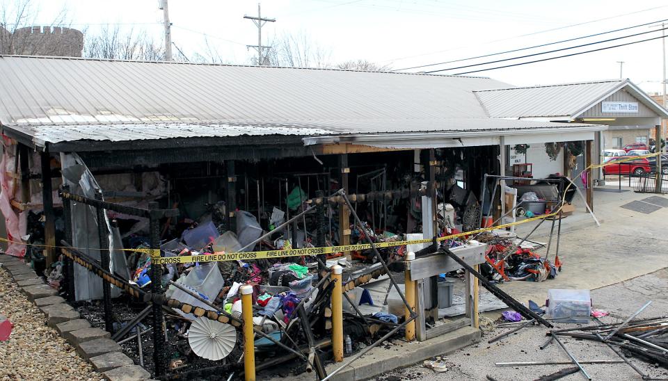 Firefighters from all three city fire stations responded to the 12:37 a.m. blaze at the St. Vincent De Paul thrift store in Bedford Tuesday.