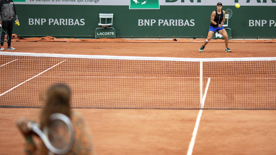 Naomi Osaka and Ash Barty, pictured here practicing together ahead of the French Open.