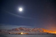 <p>A full moon illuminates the desert sky over Mount Artos in the Gevas District of Van Province, Turkey // November 26, 2017</p>