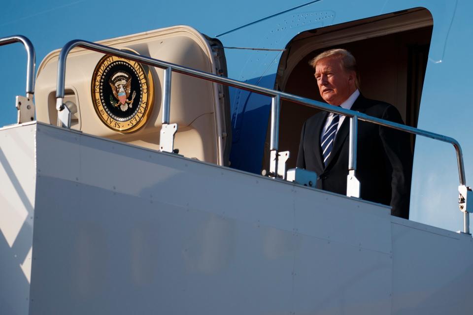 President Donald Trump steps off Air Force One.