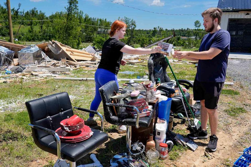 <p>George Walker IV/AP</p> Haley Loukota and Devin Johnson along Barnsley Loop, Ky., on Tuesday, May 28, 2024, 