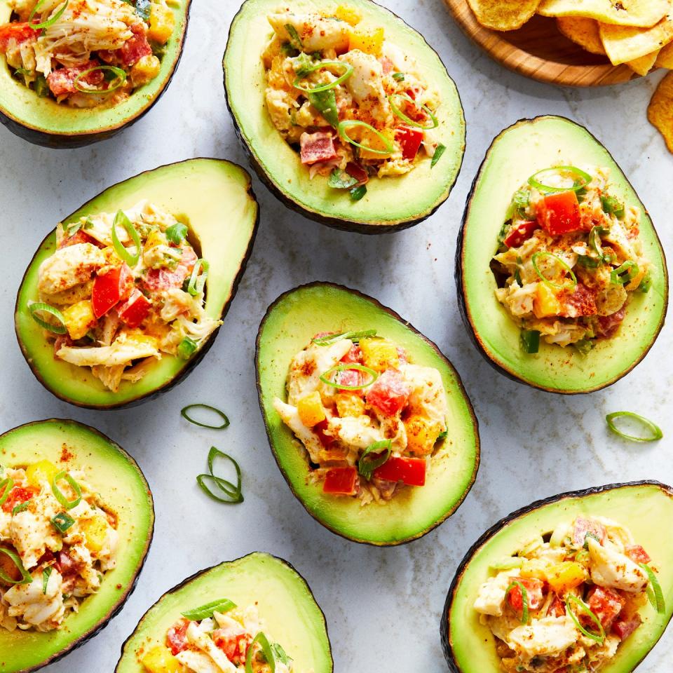 ripe avocado stuffed with chili and cumin spiced lump crab, tomato, mango, and scallion, served with plantain chips