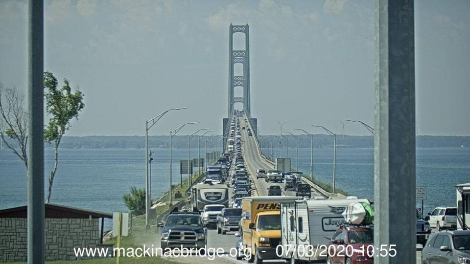 Looking south from the tollbooths, traffic is seen on the Mackinac Bridge on July 3, 2020.