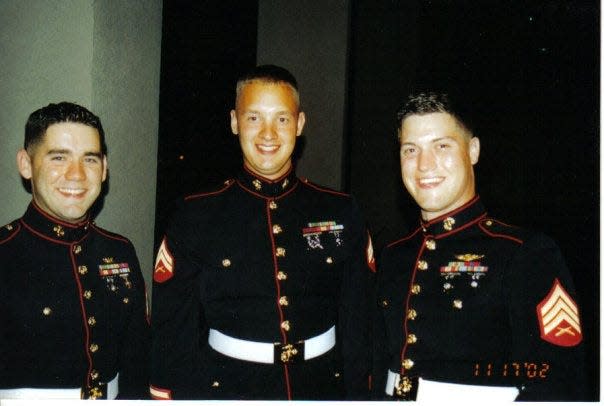 Joshua Hawley, 42, (middle) was a Baton Rouge native, pilot and flight instructor who  was killed in a Louisiana helicopter crash on Dec. 14. He was a Cherry Point Marine, Bridgeton paramedic and local volunteer firefighter.