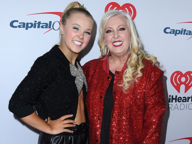 <p>Steve Granitz/FilmMagic</p> JoJo Siwa and Jessalynn Siwa arrives at the 102.7 KIIS FM's Jingle Ball 2021