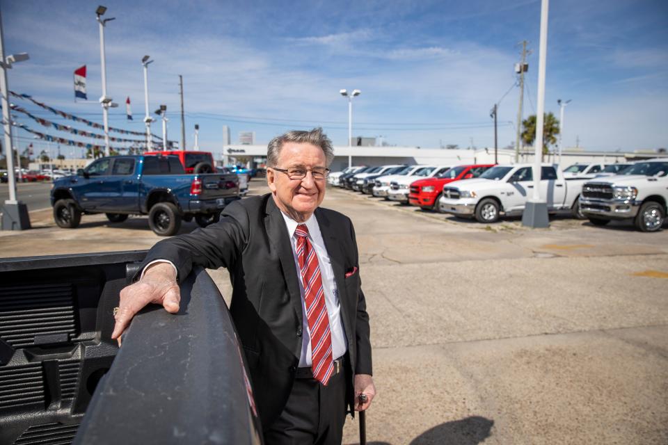State Sen. George Gainer looks over the Bay Motors car dealership in Panama City on March 5, 2021.