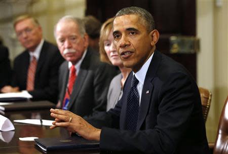 U.S. President Barack Obama meets with health insurance chief executives at the White House in Washington November 15, 2013. REUTERS/Kevin Lamarque