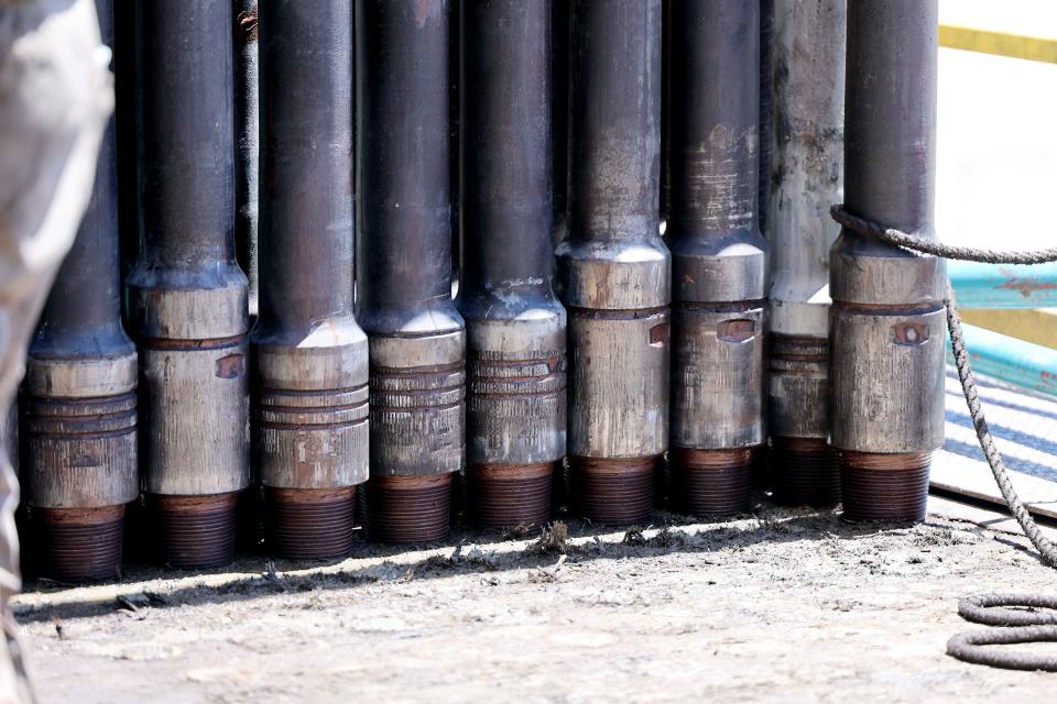 Pipes stand in a bunch waiting to be placed down the hole at a rig at the FORGE geothermal demonstration sight near Milford on Thursday, July 6, 2023. | Scott G Winterton, Deseret News
