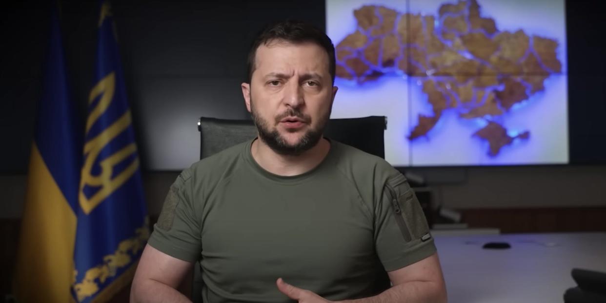 Volodymyr Zelenskyy in a pre-recorded video address to CORE on Friday June 10, 2022. He wears a green t-shirt and sits in front of a tactical map.