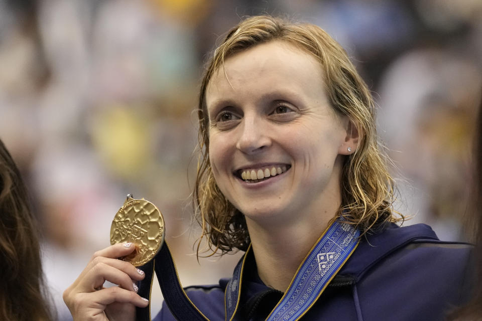 Gold medalist Katie Ledecky of United States holds her medal during ceremonies at women's 1500m freestyle finals at the World Swimming Championships in Fukuoka, Japan, Tuesday, July 25, 2023. (AP Photo/Lee Jin-man)