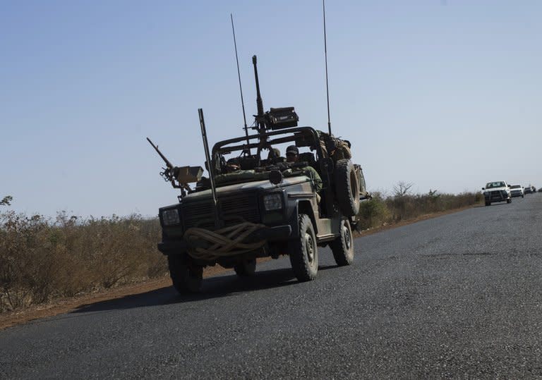 French soldiers drive a military jeep near Markala on January 18, 2013. West African leaders Saturday called for greater international involvement in Mali as they met to speed up the deployment of regional troops to boost a French-backed offensive to halt an Islamist onslaught