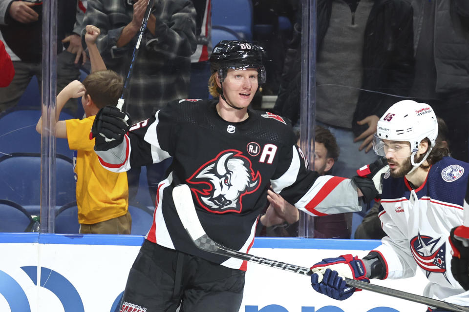 Buffalo Sabres defenseman Rasmus Dahlin (26) celebrates his goal against the Columbus Blue Jackets during the first period of an NHL hockey game Tuesday, Dec. 19, 2023, in Buffalo, N.Y. (AP Photo/Jeffrey T. Barnes)