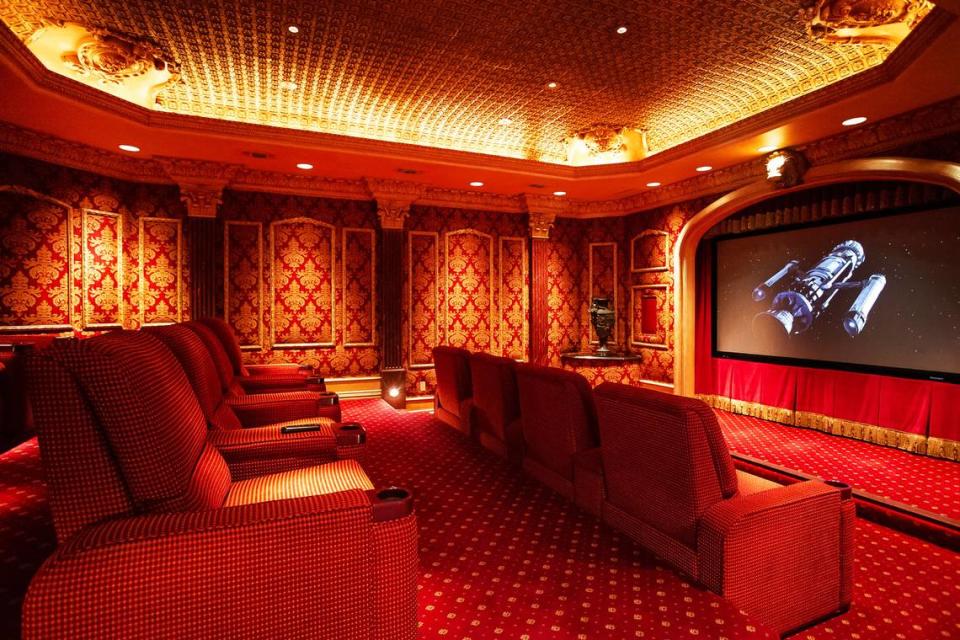 The 12,000-square-foot home features a home theater. (Interluxe Auctions)