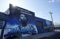 A street mural of the late rapper Nipsey Hussle is pictured, Thursday, June 30, 2022, in the Boyle Heights section of Los Angeles. The many murals of Hussle around Los Angeles speak to the late rapper's lasting legacy. (AP Photo/Chris Pizzello)