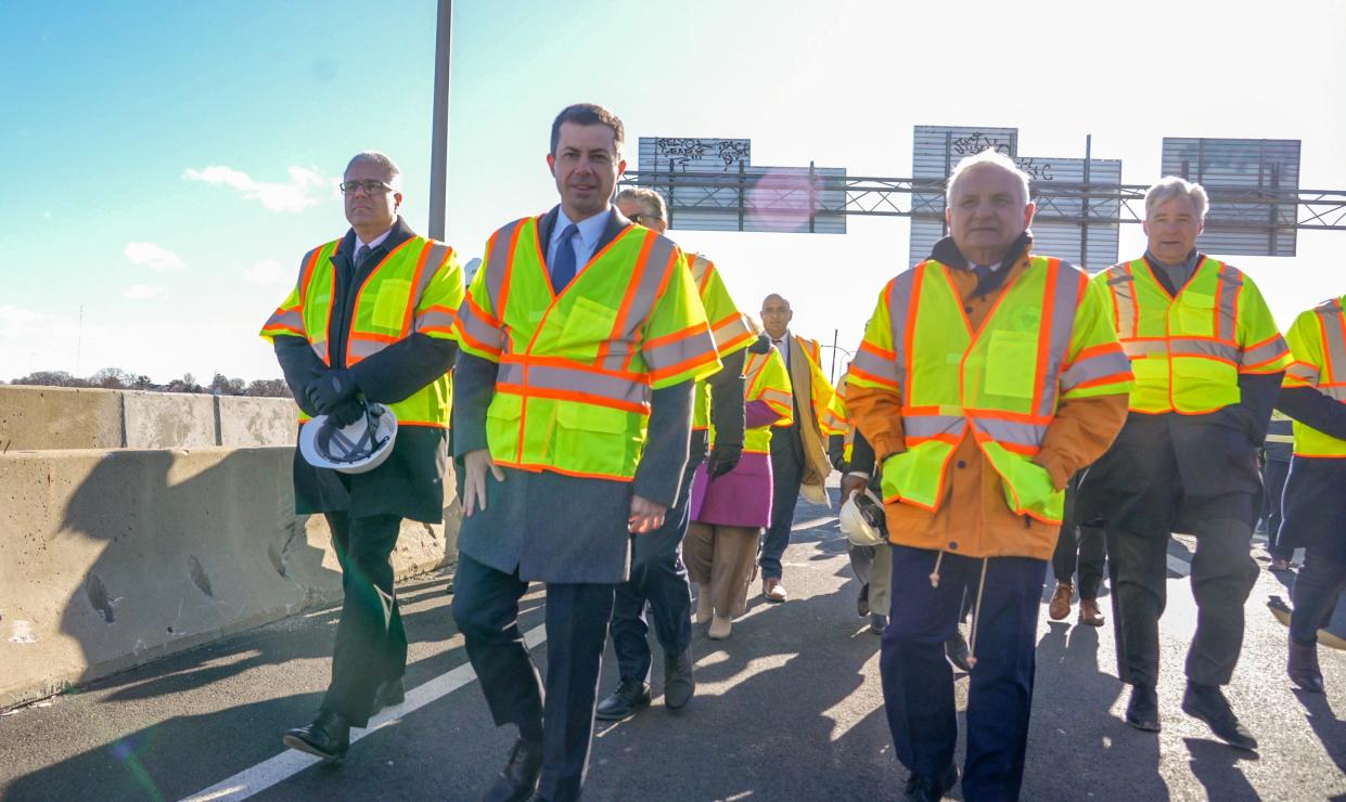 U.S. Transportation Secretary Pete Buttigieg, center left, tours the Washington Bridge on Tuesday with members of Rhode Island's congressional delegation and state and federal officials.