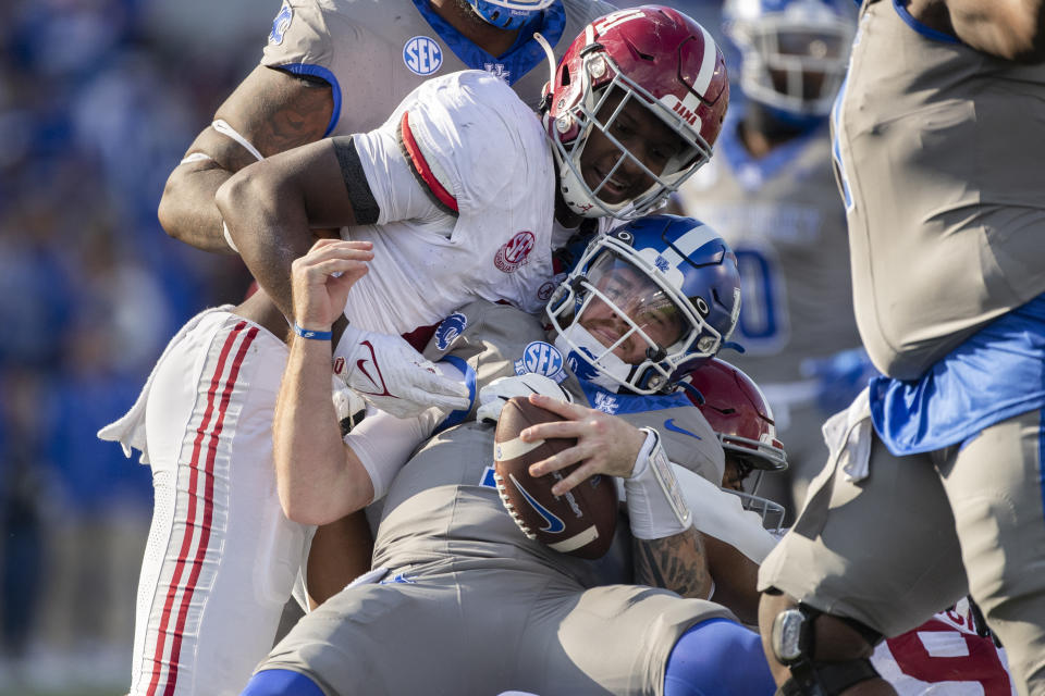 Alabama linebacker Chris Braswell (41) sacks Kentucky quarterback Devin Leary (13) during the second half of an NCAA college football game in Lexington, Ky., Saturday, Nov. 11, 2023. (AP Photo/Michelle Haas Hutchins)