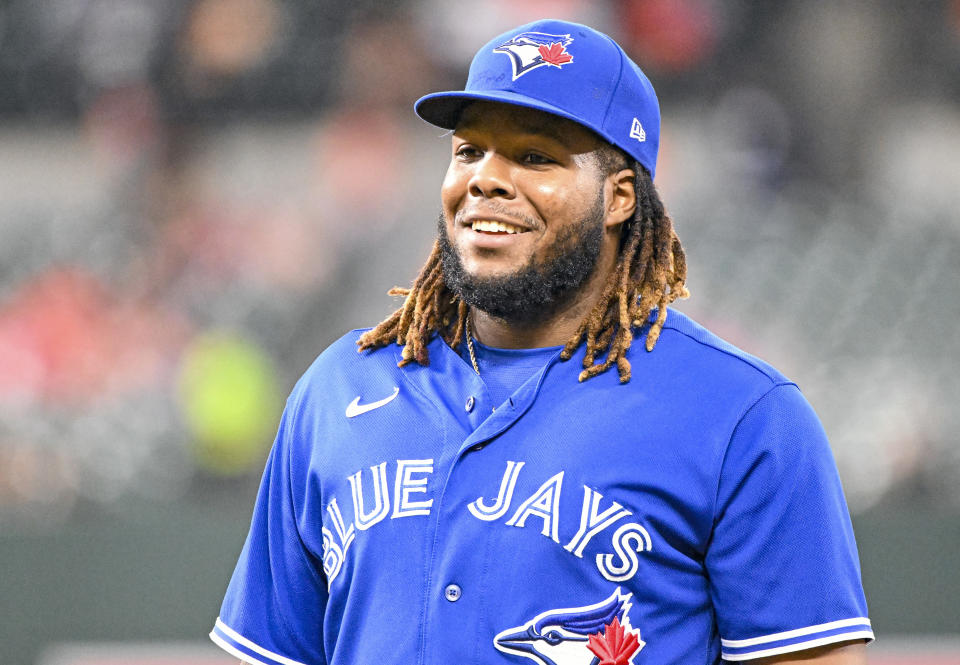 BALTIMORE, MD - SEPTEMBER 07: Toronto Blue Jays first baseman Vladimir Guerrero Jr. (27) smiles during the Toronto Blue Jays game versus the Baltimore Orioles on September 7, 2022 at Orioles Park at Camden Yards, in Baltimore, MD.  The Blue Jays defeated the Orioles, 4-1.   (Photo by Mark Goldman/Icon Sportswire via Getty Images)