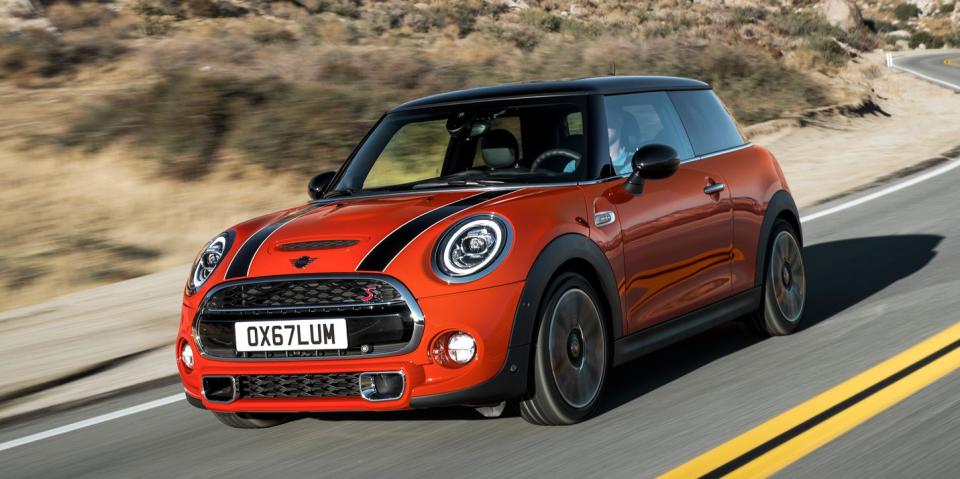 2022 mini cooper s 2 door hardtop drives on twisting road