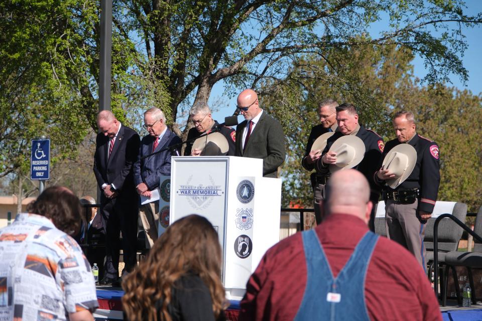 Officials pay tribute to fallen DPS Trooper Steve Booth Thursday at the Texas Panhandle War Memorial Center in Amarillo.