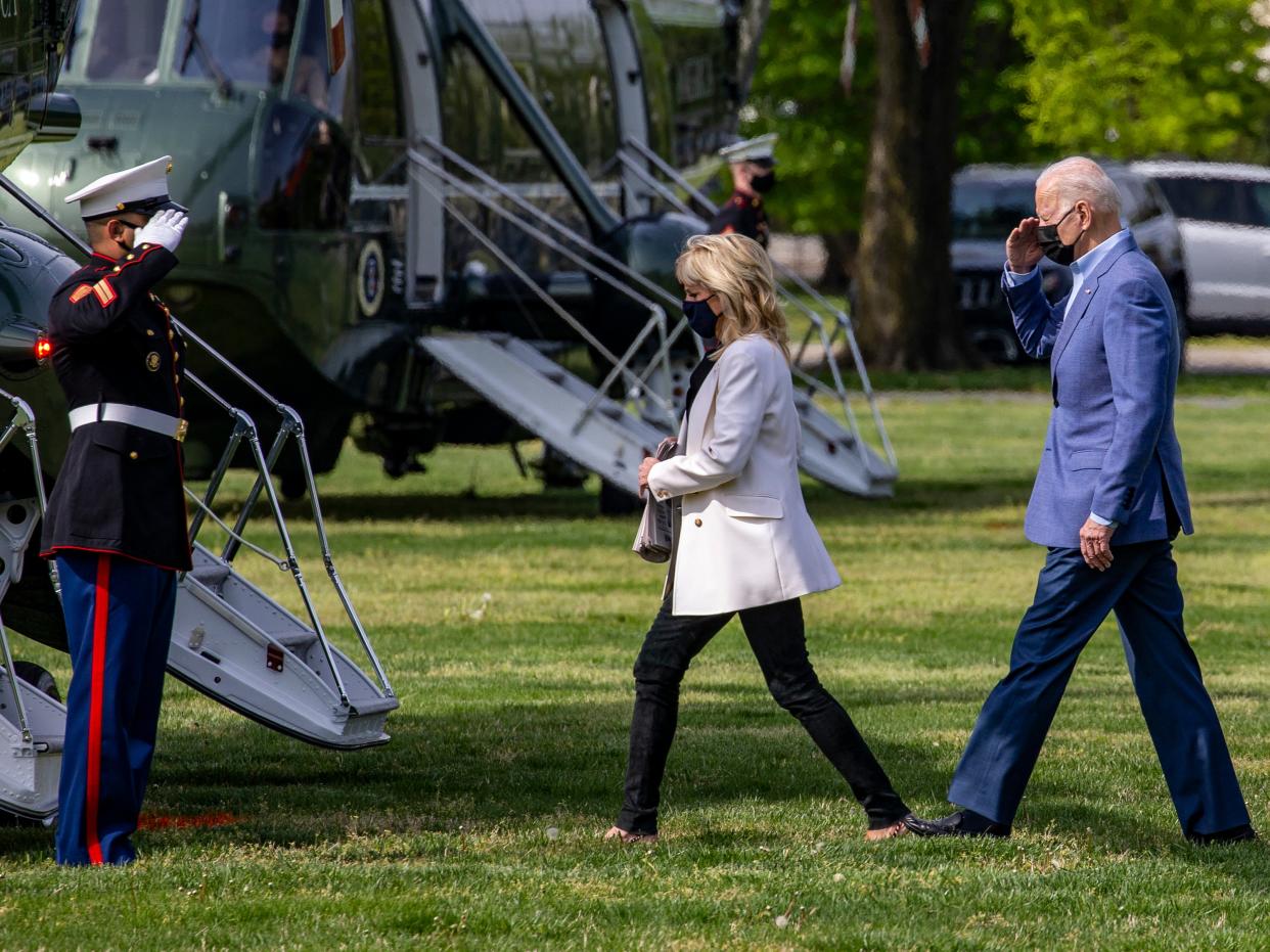 First lady Jill Biden and U.S. President Joe Biden walk on the ellipse to Marine One on April 24, 2021 in Washington, DC.  (Getty Images)