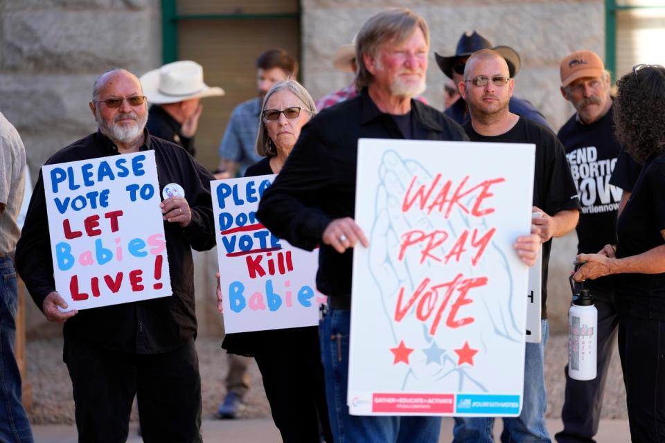 Anti-abortion supporters stand outside at the Capitol, Wednesday, May 1, 2024, in Phoenix. (AP)